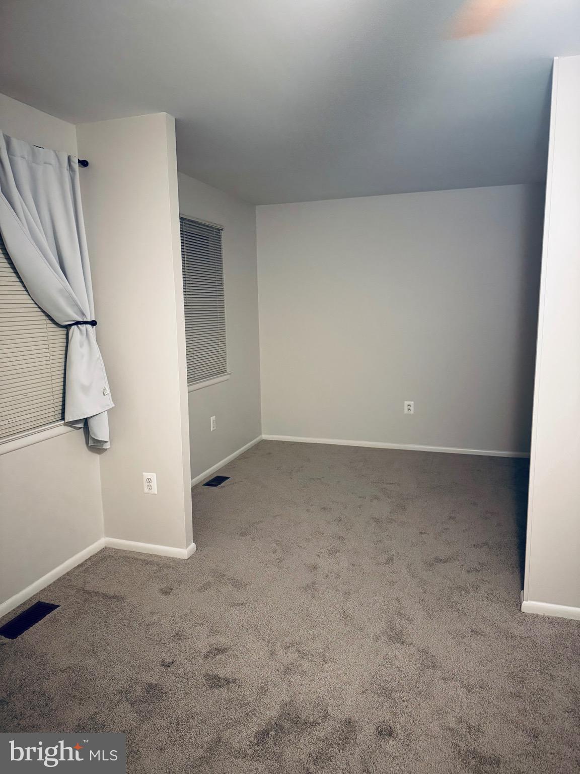 15839 Millbrook Lane, Unit 122 Laurel, MD 20707 - Photo 14 of 19 an empty room with a door