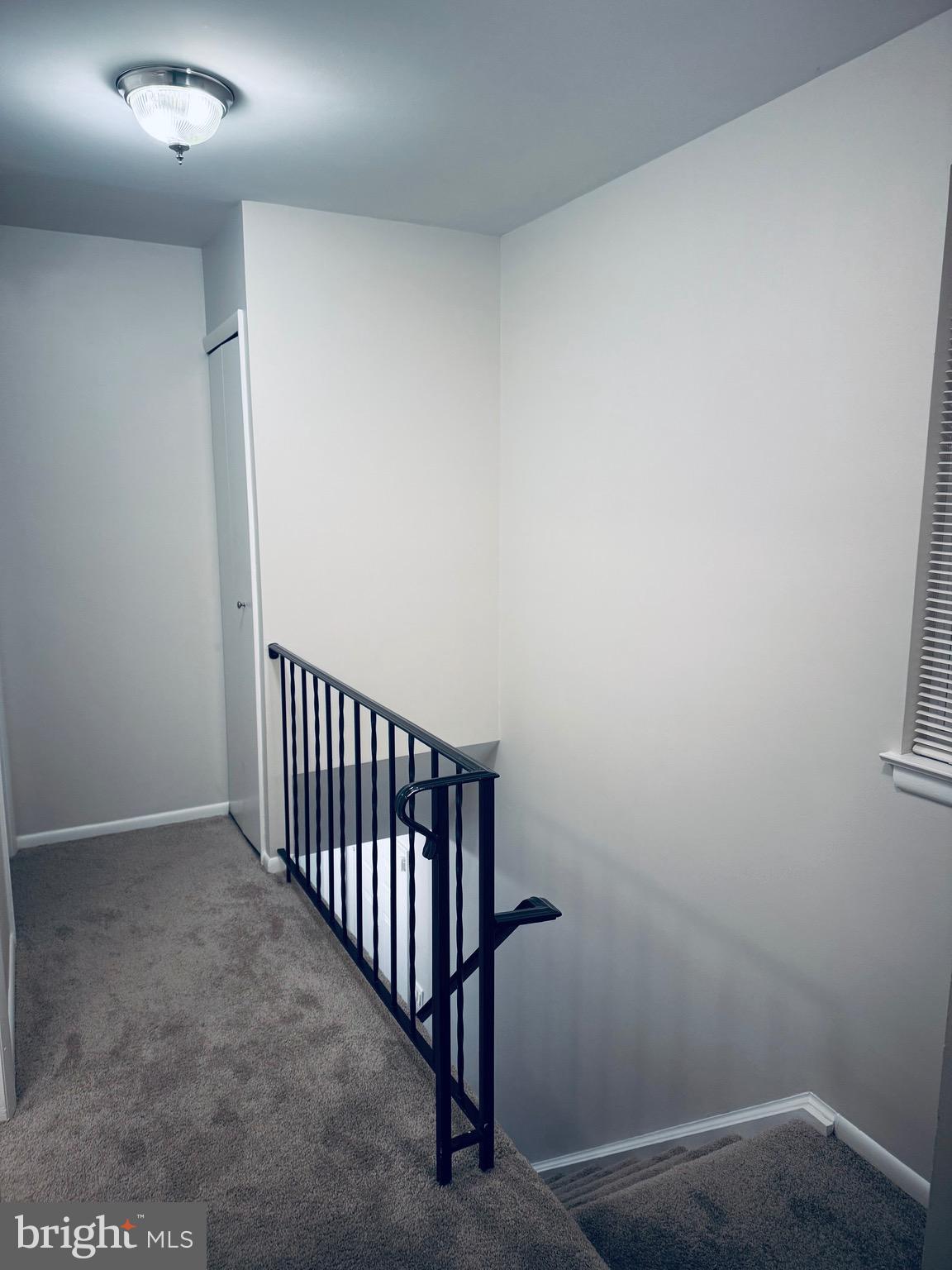 15839 Millbrook Lane, Unit 122 Laurel, MD 20707 - Photo 18 of 19 a view of a hallway