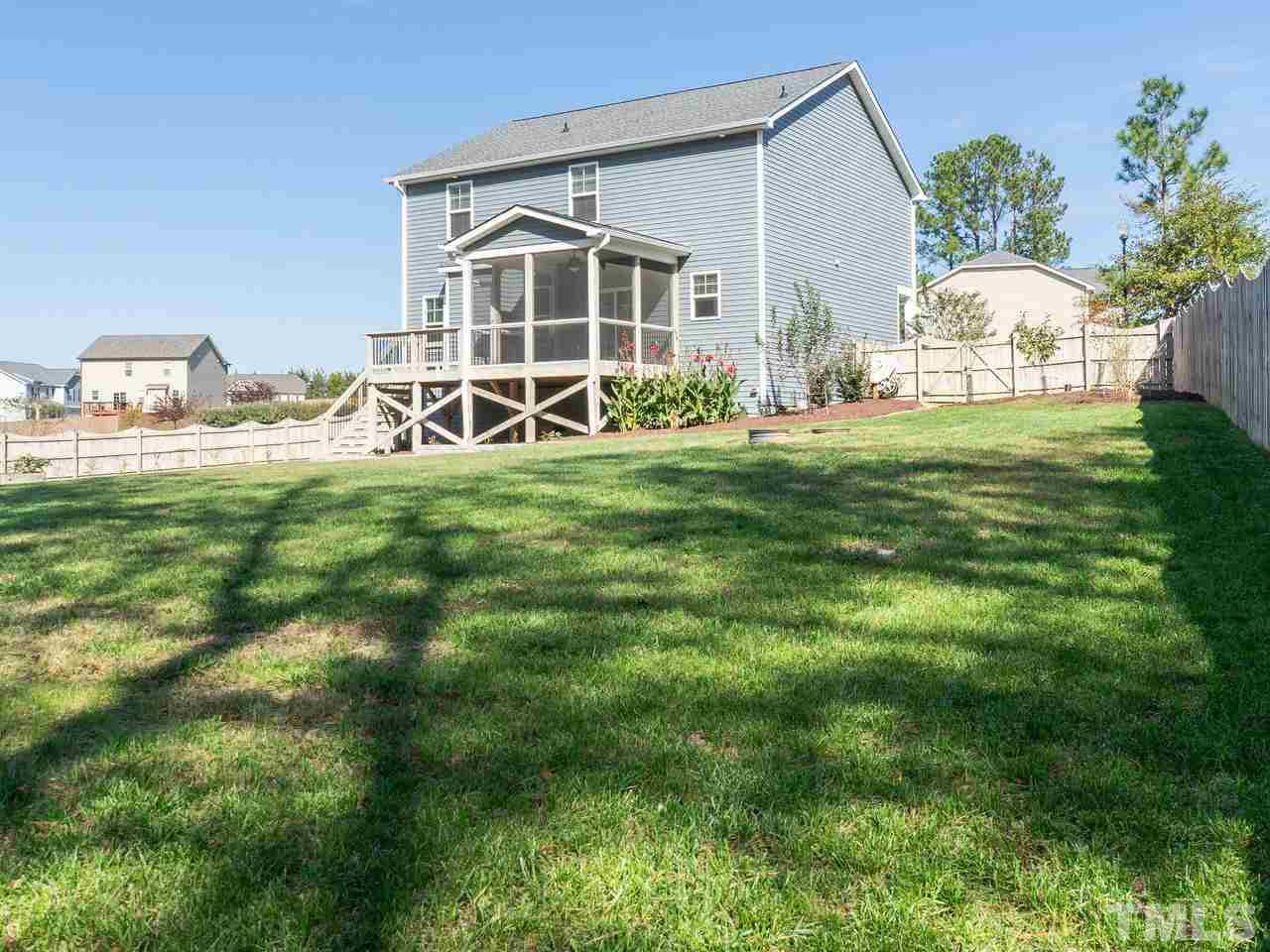1132 Silver Farm Road Raleigh, NC 27603 - Photo 11 of 11 a front view of a house with garden