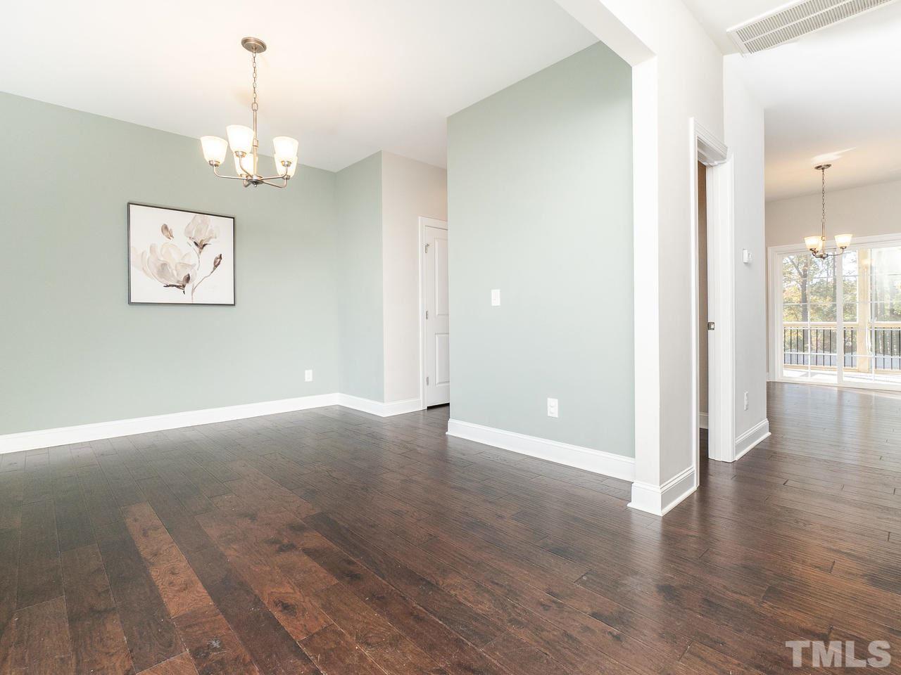 1132 Silver Farm Road Raleigh, NC 27603 - Photo 5 of 11 a view of a room with wooden floor