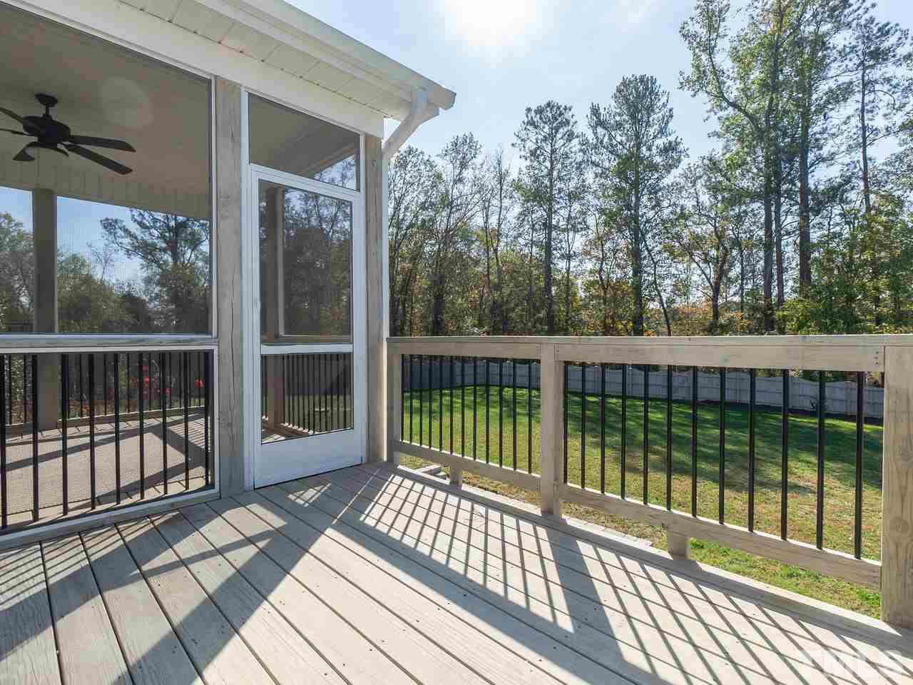 1132 Silver Farm Road Raleigh, NC 27603 - Photo 9 of 11 a view of a balcony with wooden floor