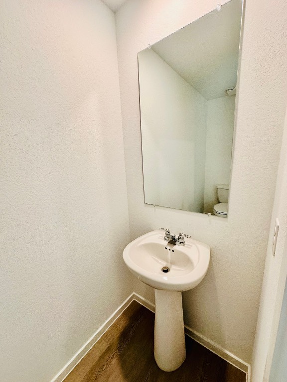 3041 Merganser Rdg Drive Katy, TX 77493 - Photo 13 of 28 a bathroom with a sink and a mirror