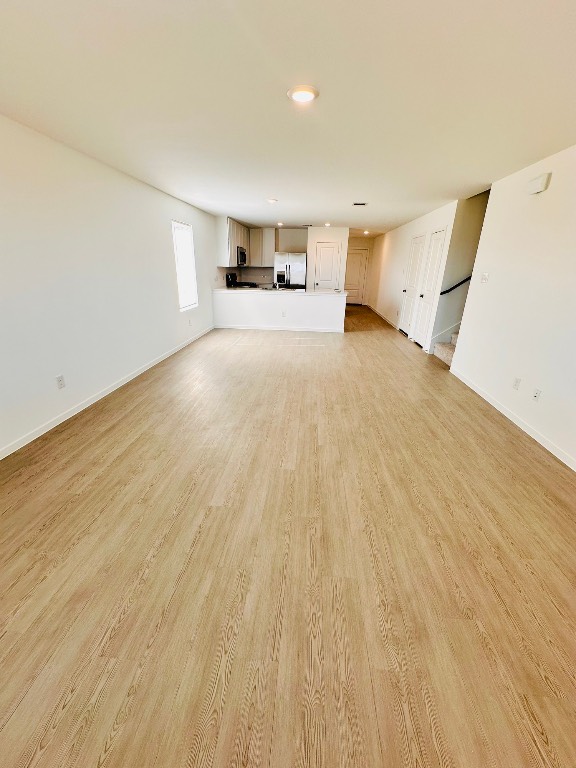 3041 Merganser Rdg Drive Katy, TX 77493 - Photo 14 of 28 a view of a kitchen with furniture and wooden floor