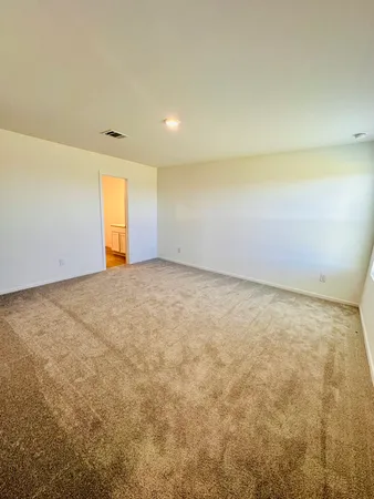 an empty room with a natural light
