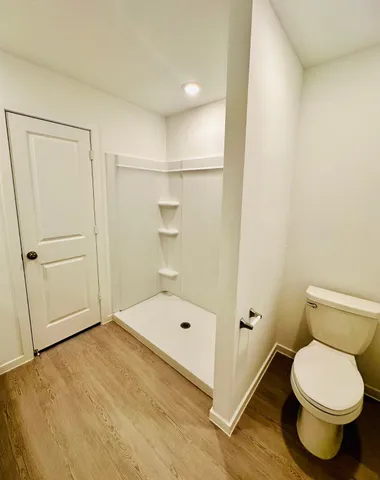 a bathroom with 2 sink and a mirror