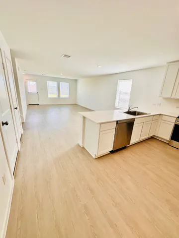 a utility room with washer and dryer