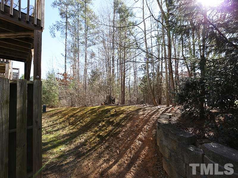 1402 Holly Grove Way Durham, NC 27713 - Photo 18 of 19 a view of a backyard of the house