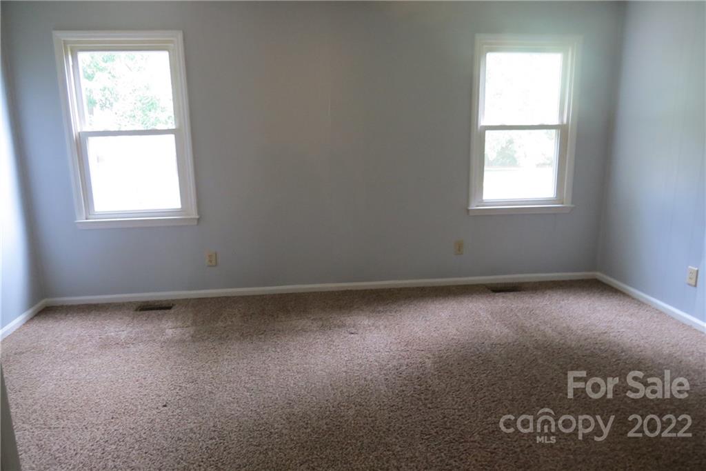 1316 Mayberry Road Dallas, NC 28034 - Photo 15 of 23 an empty room with a window