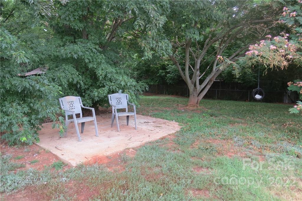 1316 Mayberry Road Dallas, NC 28034 - Photo 21 of 23 a view of a chairs and table in the garden