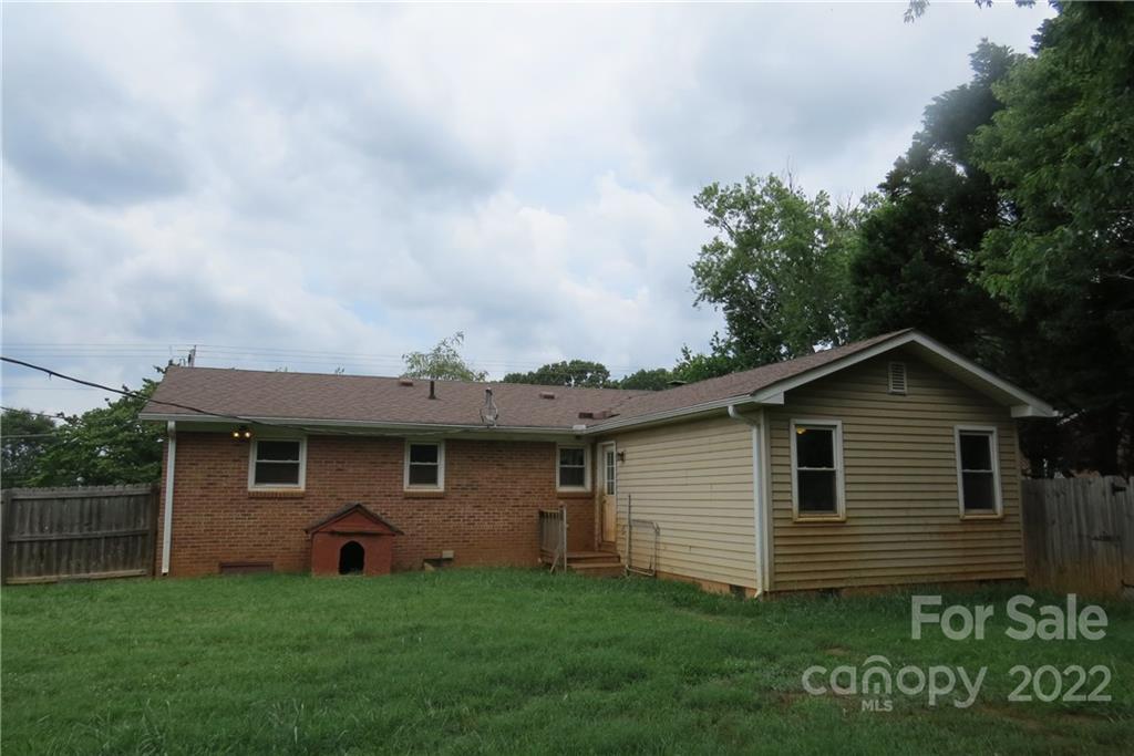 1316 Mayberry Road Dallas, NC 28034 - Photo 22 of 23 a view of a house with a yard
