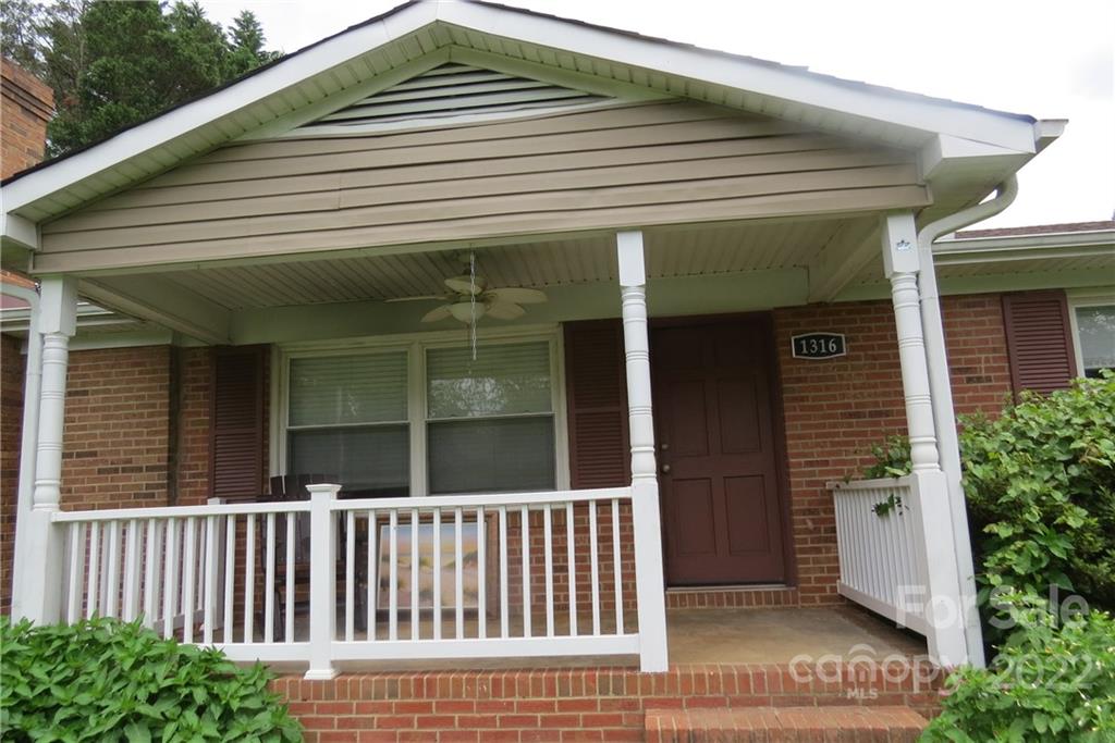 1316 Mayberry Road Dallas, NC 28034 - Photo 4 of 23 a view of a house with porch