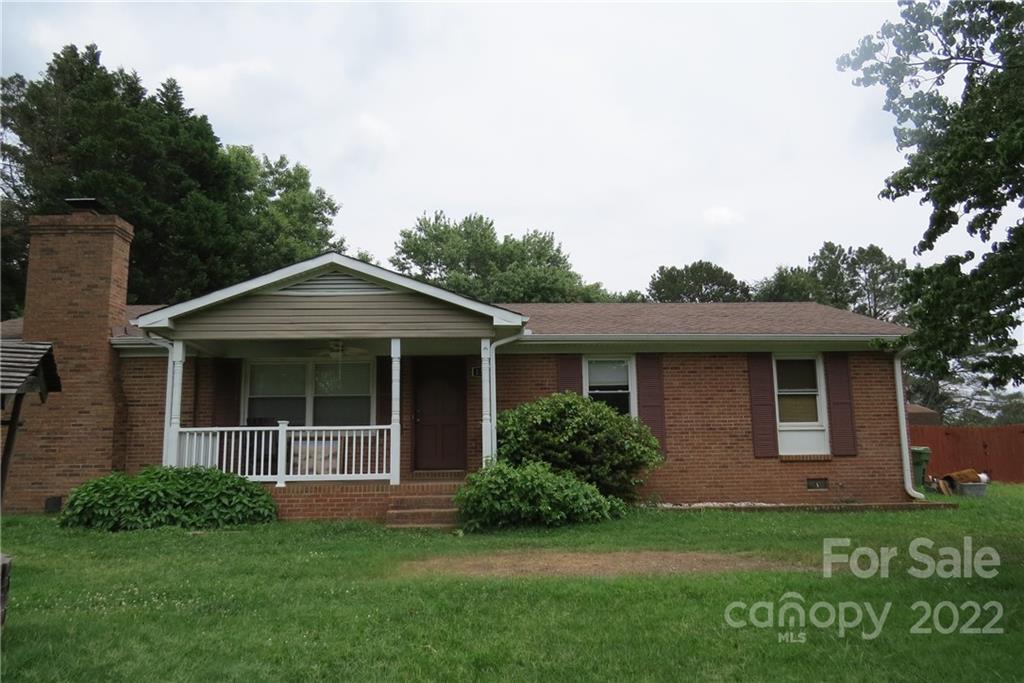 1316 Mayberry Road Dallas, NC 28034 - Photo 6 of 23 a view of front of a house with a yard