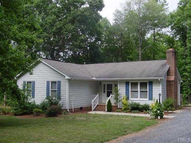 6322 Guess Road Durham, NC 27712 - Photo 1 of 1 a view of a house with a yard and plants