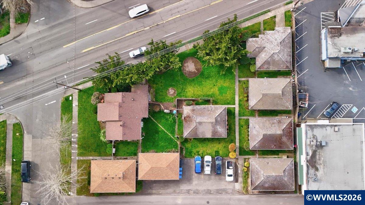 1735 Market Street Northeast Salem, OR 97301 - Photo 1 of 11 an aerial view of multiple houses with a yard