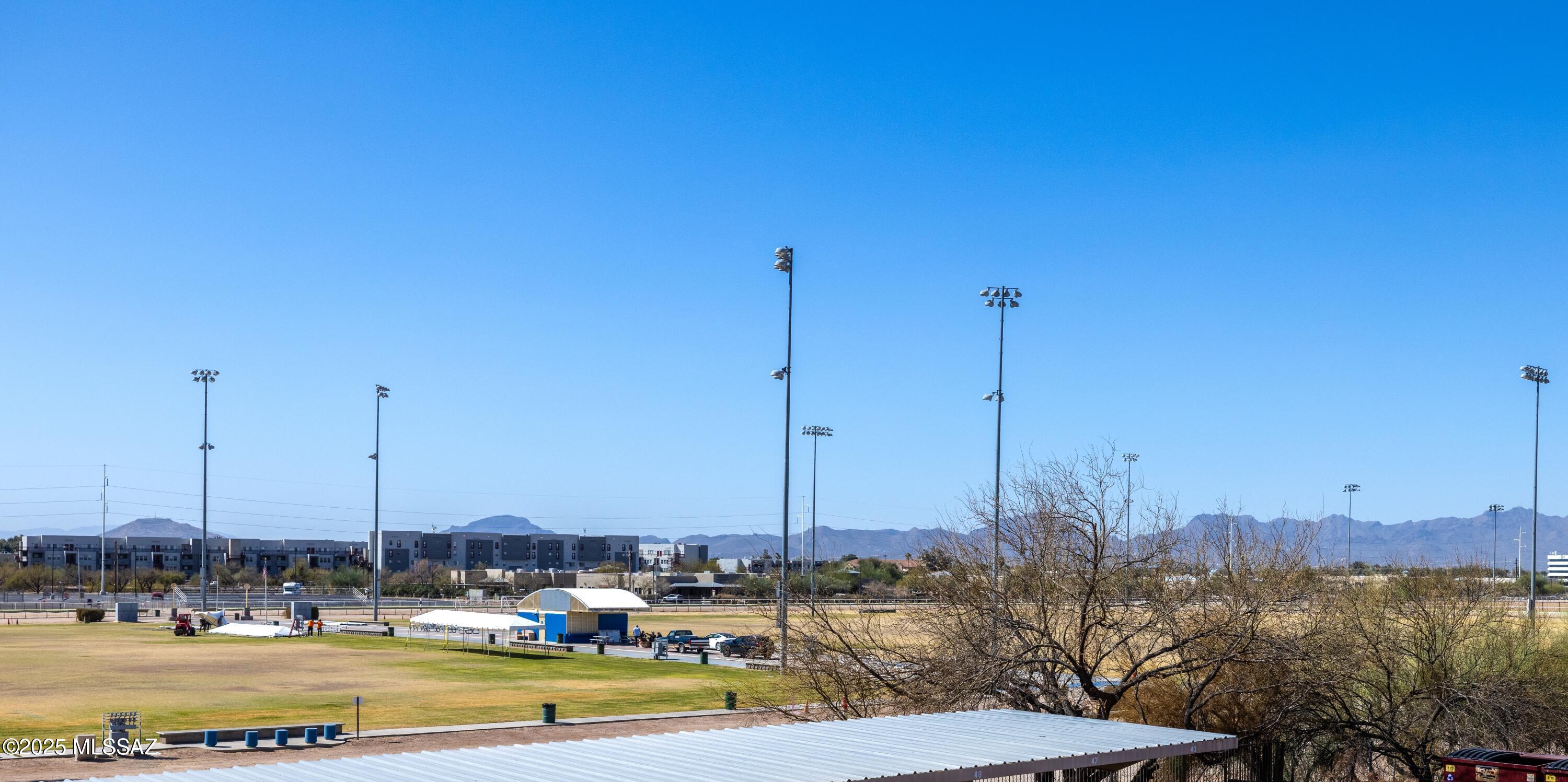 1200 East River Road, Unit G88 Tucson, AZ 85718 - Photo 11 of 13 a view of lake and small yard