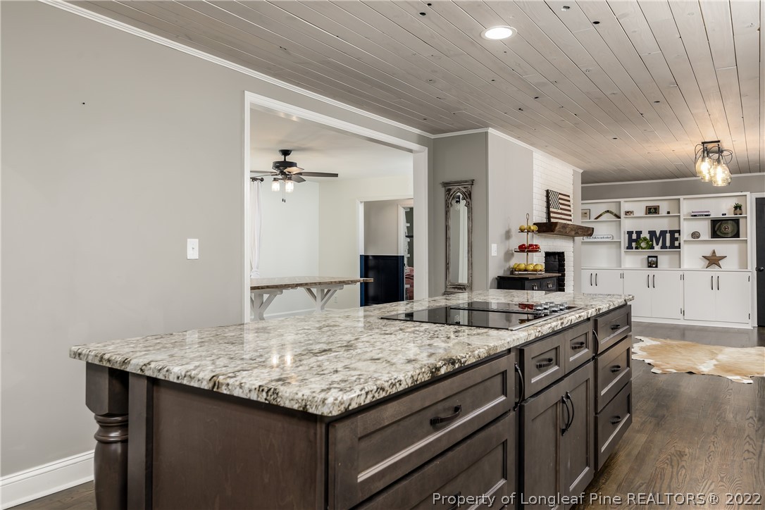 190 Valhalla Road Southern Pines, NC 28387 - Photo 13 of 39 a bathroom with a granite countertop sink and a mirror