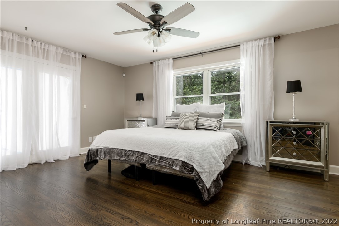 190 Valhalla Road Southern Pines, NC 28387 - Photo 15 of 39 a spacious bedroom with a bed and a window
