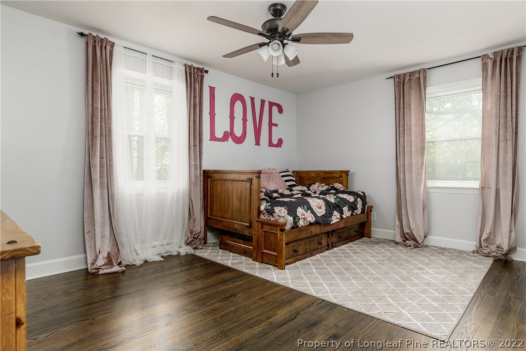 190 Valhalla Road Southern Pines, NC 28387 - Photo 22 of 39 a bed room with a bed and a window