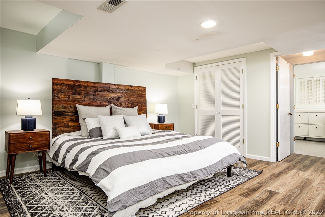 190 Valhalla Road Southern Pines, NC 28387 - Photo 30 of 39 a bedroom with a bed and a closet