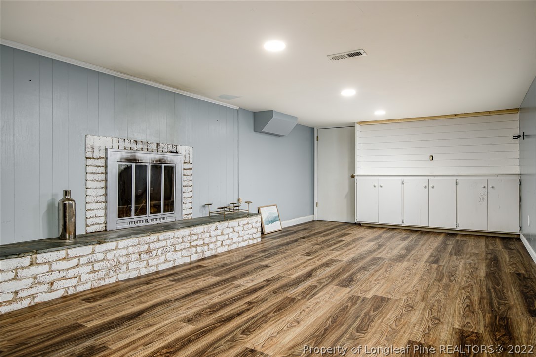 190 Valhalla Road Southern Pines, NC 28387 - Photo 31 of 39 a view of a kitchen with kitchen island sink and refrigerator