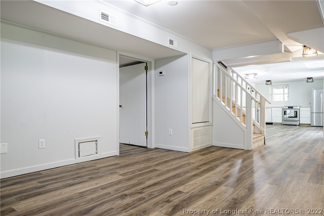 190 Valhalla Road Southern Pines, NC 28387 - Photo 33 of 39 a view of a hallway with wooden floor and entryway
