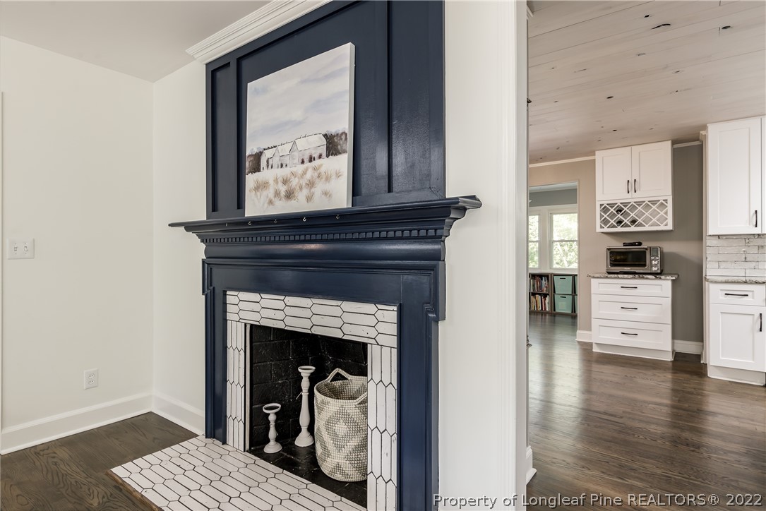 190 Valhalla Road Southern Pines, NC 28387 - Photo 7 of 39 a living room with furniture and a fireplace