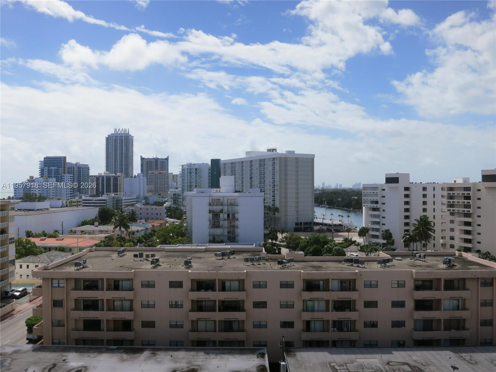 401 69th Street, Unit 906 Miami Beach, FL 33141 - Photo 15 of 24 a city view with tall buildings