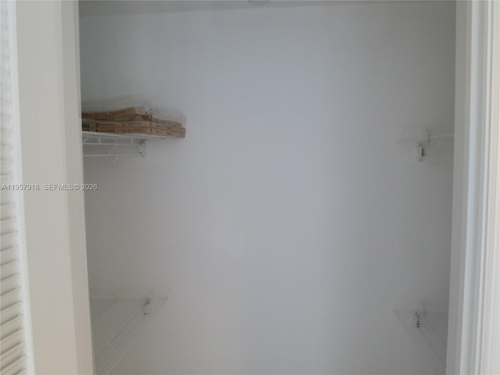 401 69th Street, Unit 906 Miami Beach, FL 33141 - Photo 6 of 24 close up of a white marble wall