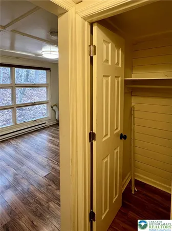 a bedroom with a bed and a fireplace