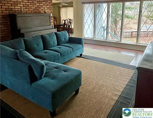 a bedroom with bed and a window