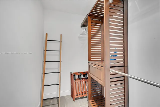 a view of a hallway with stairs