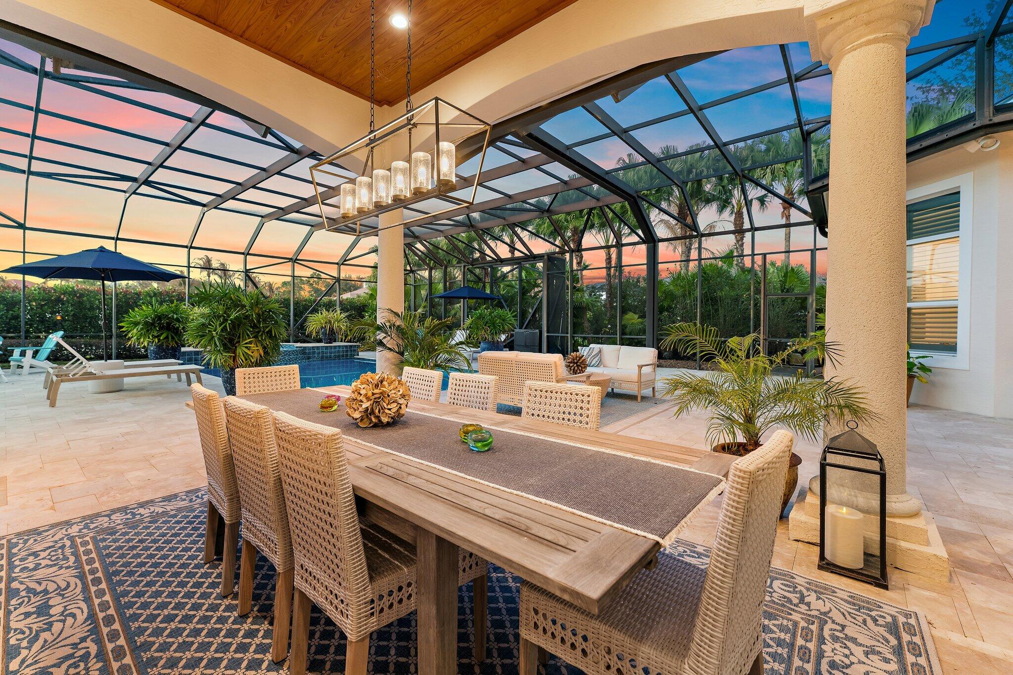6283 Southeast Moss Ridge Pointe Hobe Sound, FL 33455 - Photo 65 of 89 Outdoor Dining Area - Twilight