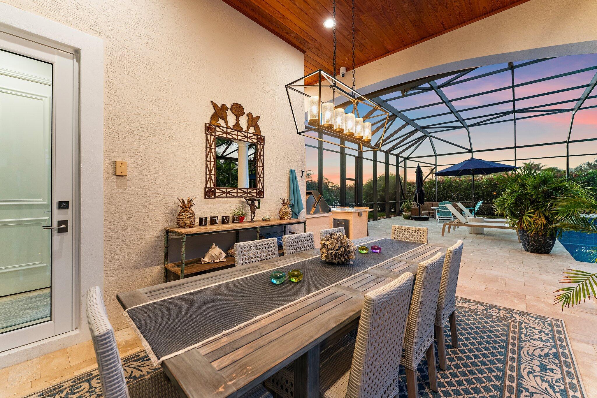 6283 Southeast Moss Ridge Pointe Hobe Sound, FL 33455 - Photo 67 of 89 Outdoor Dining Area - Twilight