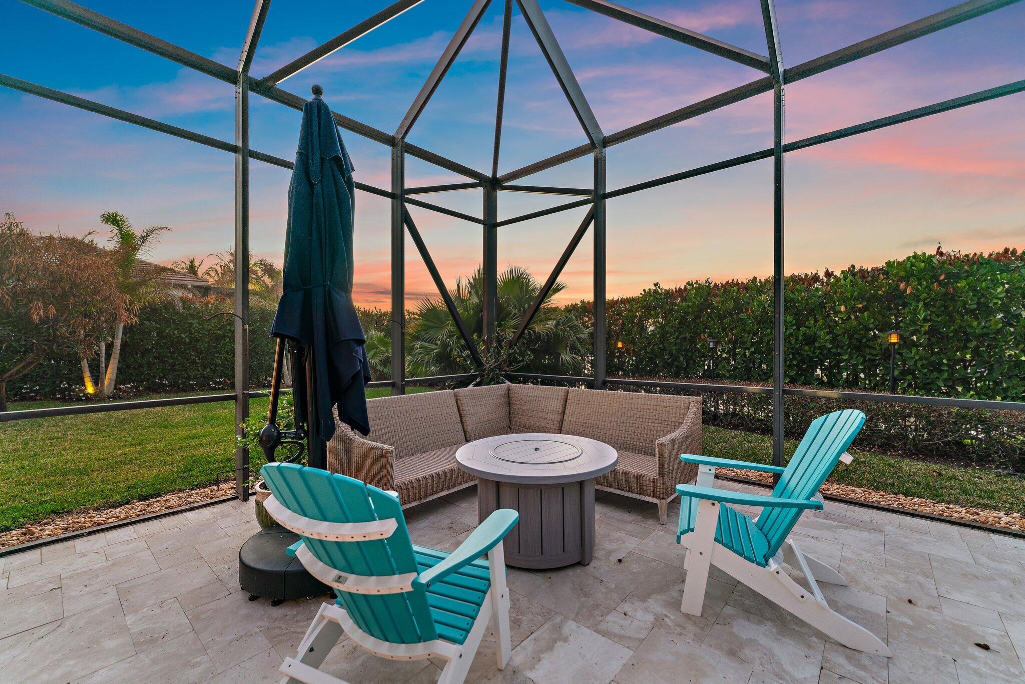 6283 Southeast Moss Ridge Pointe Hobe Sound, FL 33455 - Photo 79 of 89 Pool Area Seating - Twilight