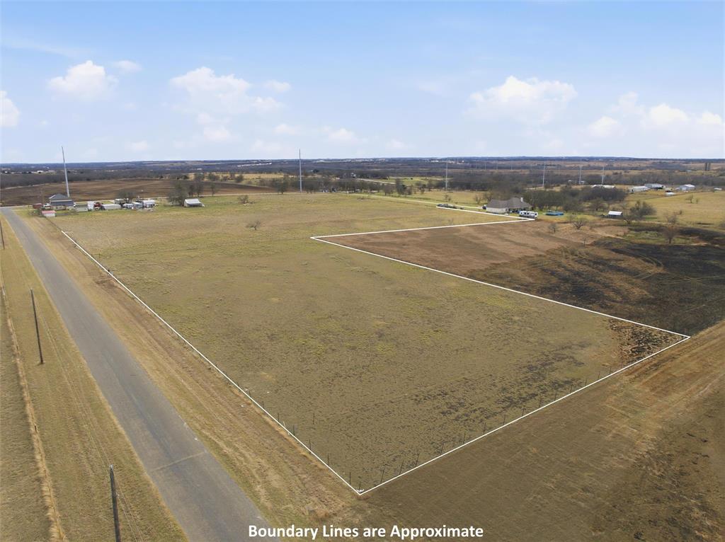 544 Wade Road Eddy, TX 76524 - Photo 22 of 22 a view of an outdoor space and tennis court