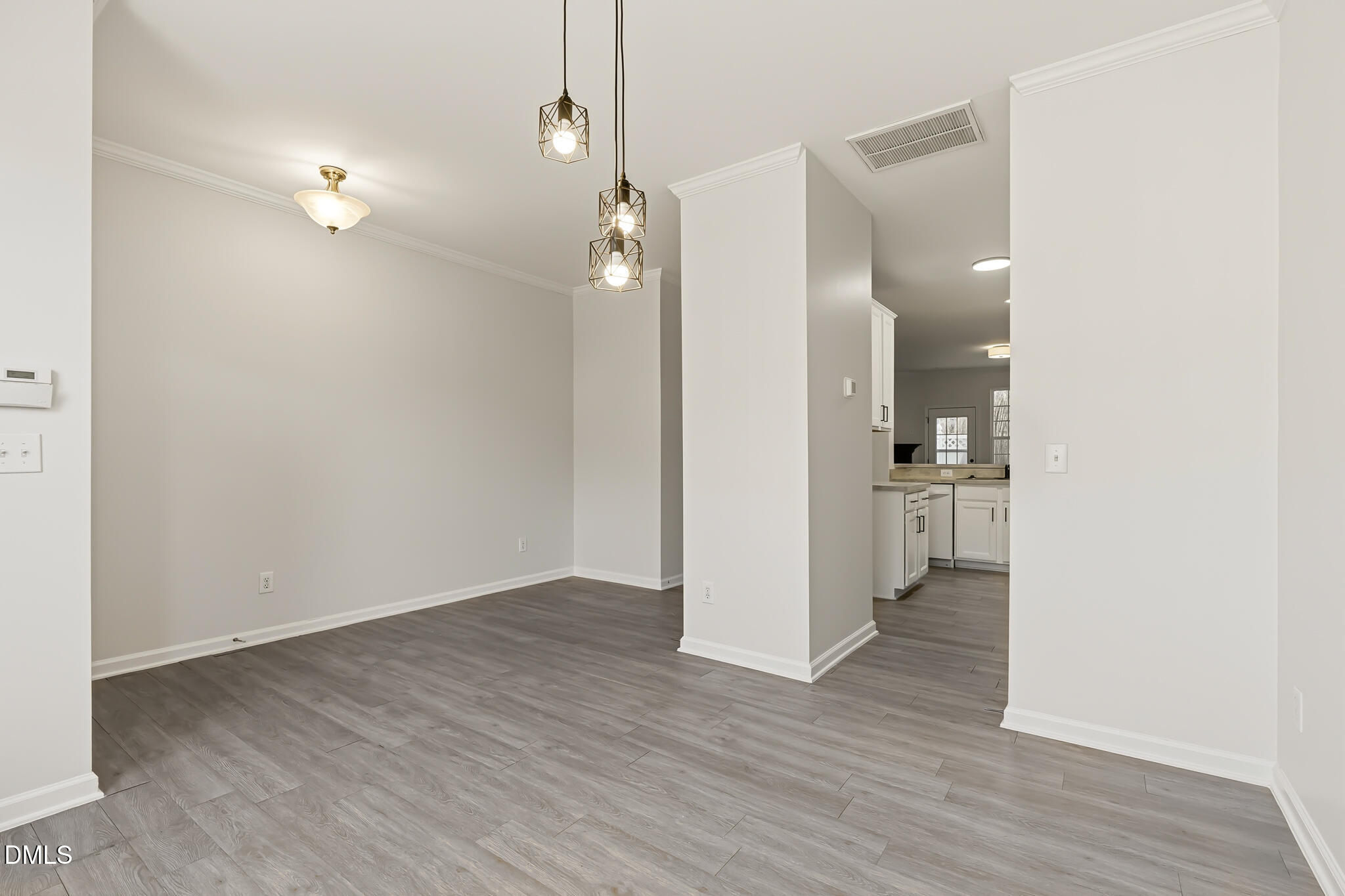 4536 Sugarbend Way Raleigh, NC 27606 - Photo 11 of 45 Foyer and Dining Room