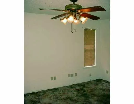 a view of a small space with a fan