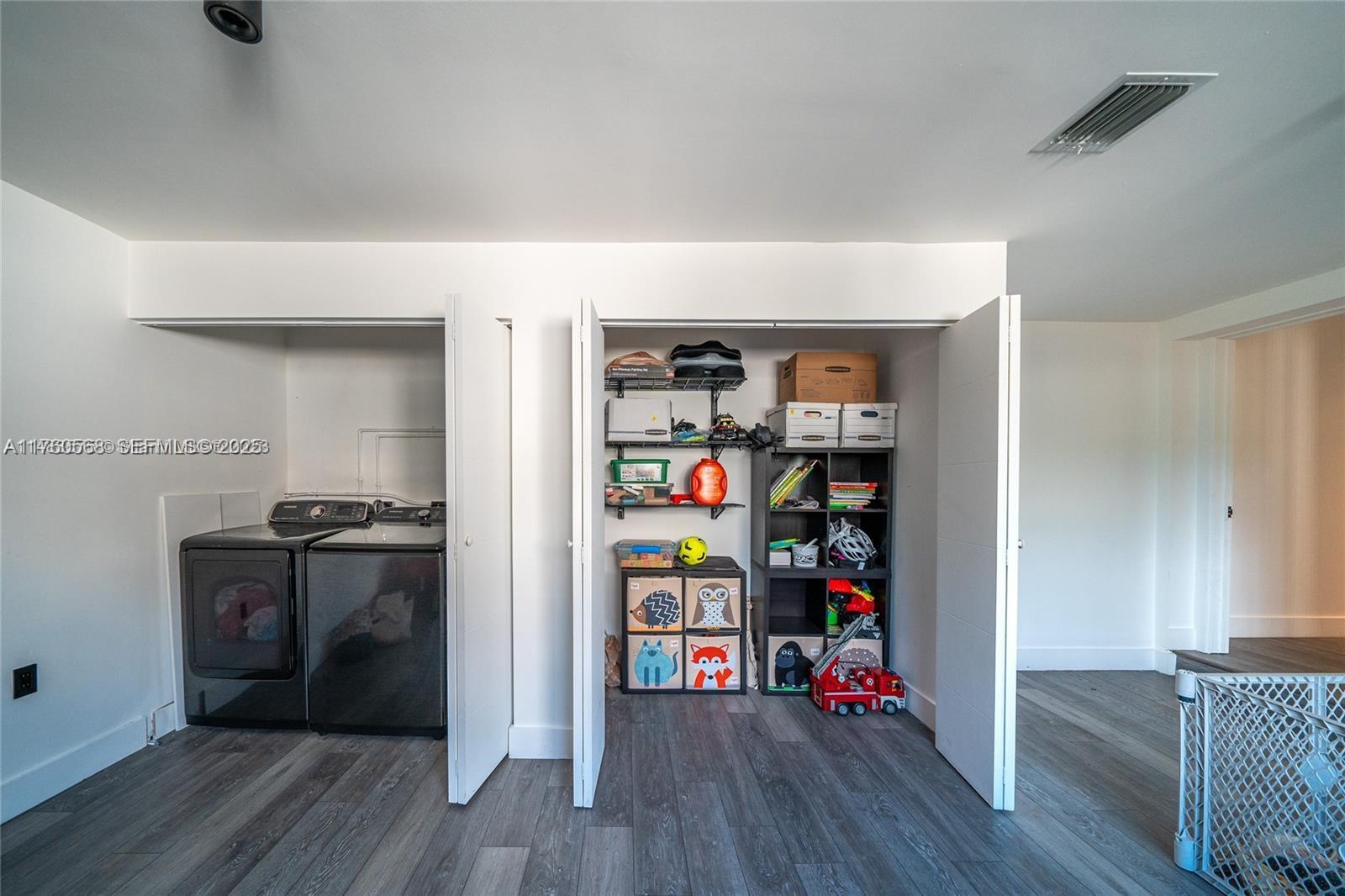 19600 Northeast 19th Avenue Miami, FL 33179 - Photo 27 of 33 a view of a livingroom with wooden floor