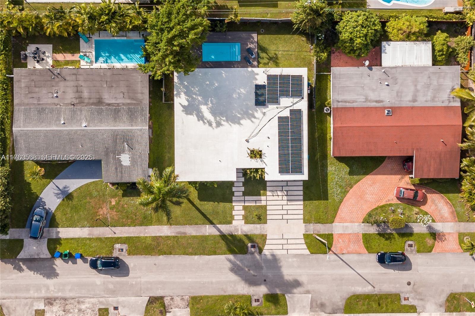 19600 Northeast 19th Avenue Miami, FL 33179 - Photo 33 of 33 an aerial view of a house with a swimming pool