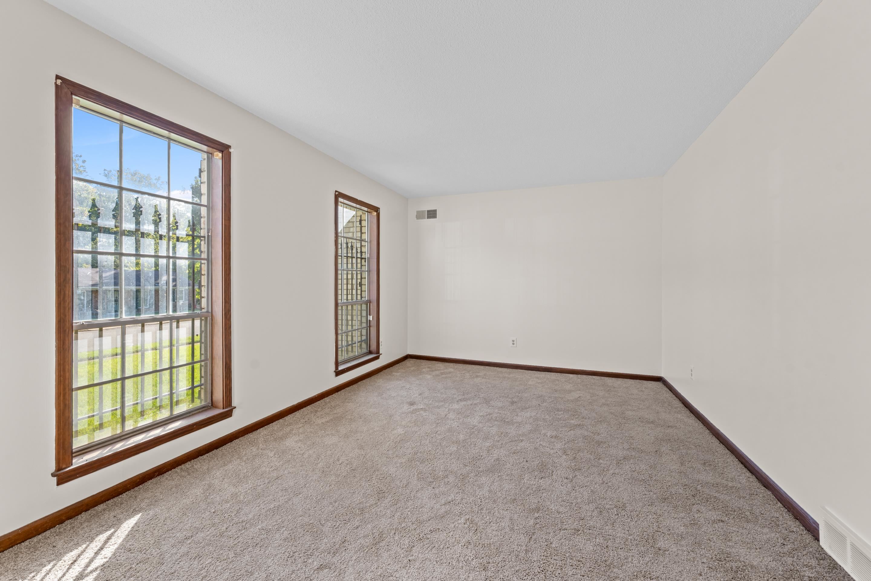 3095 Spring Hill Cove Memphis, TN 38127 - Photo 17 of 29 a view of an empty room with a window