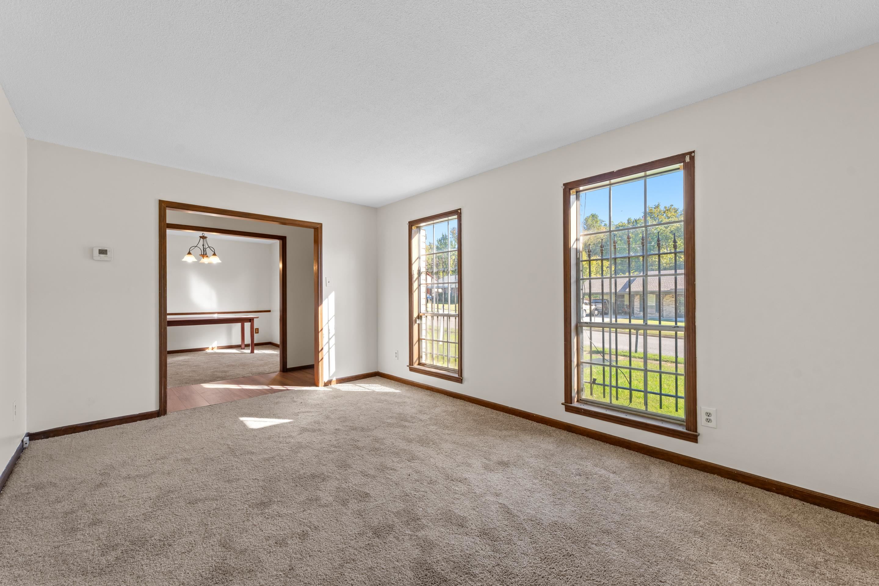 3095 Spring Hill Cove Memphis, TN 38127 - Photo 18 of 29 an empty room with windows and cabinet