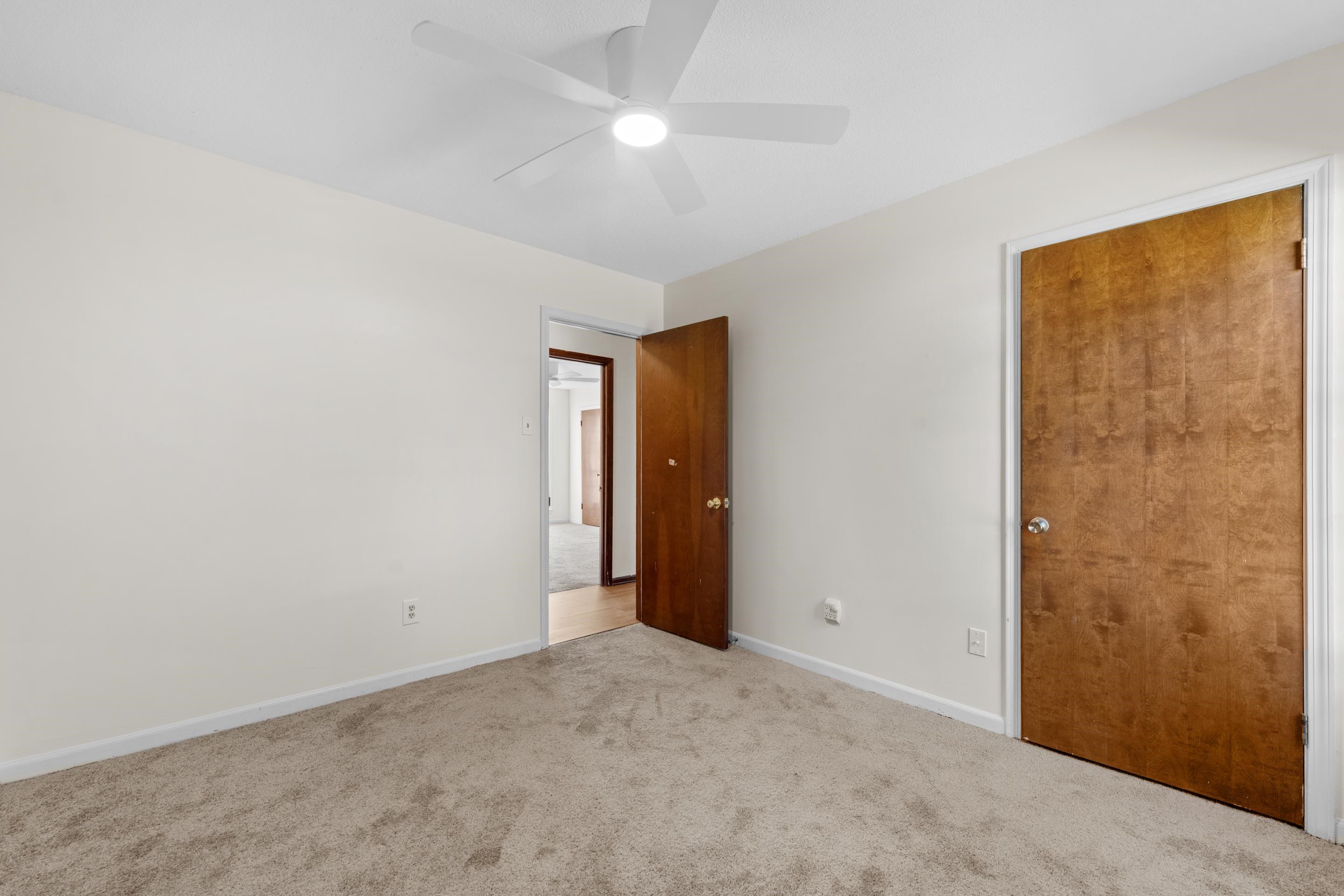 3095 Spring Hill Cove Memphis, TN 38127 - Photo 22 of 29 a view of an empty room with closet and a window