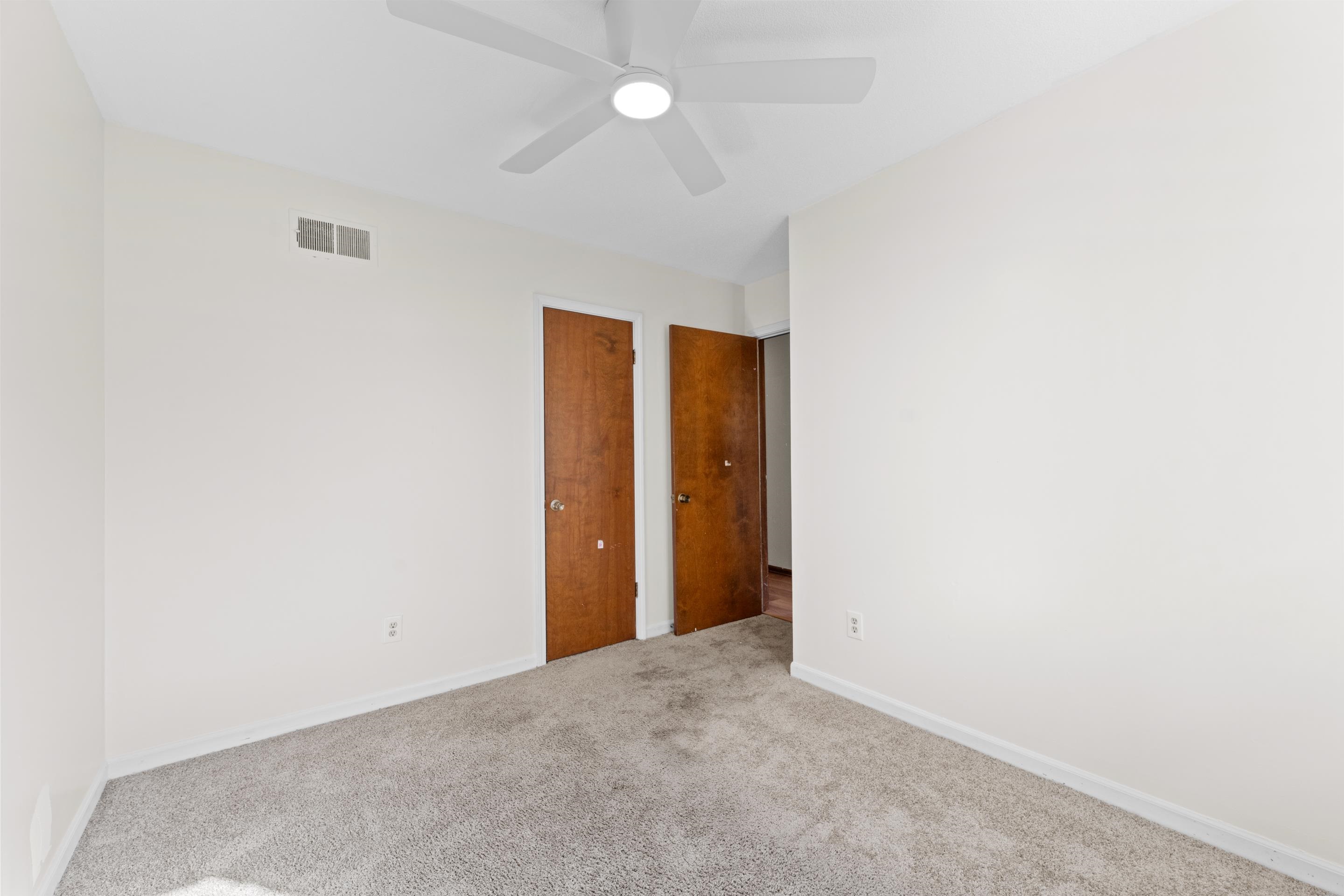 3095 Spring Hill Cove Memphis, TN 38127 - Photo 26 of 29 an empty room with closet and a ceiling fan
