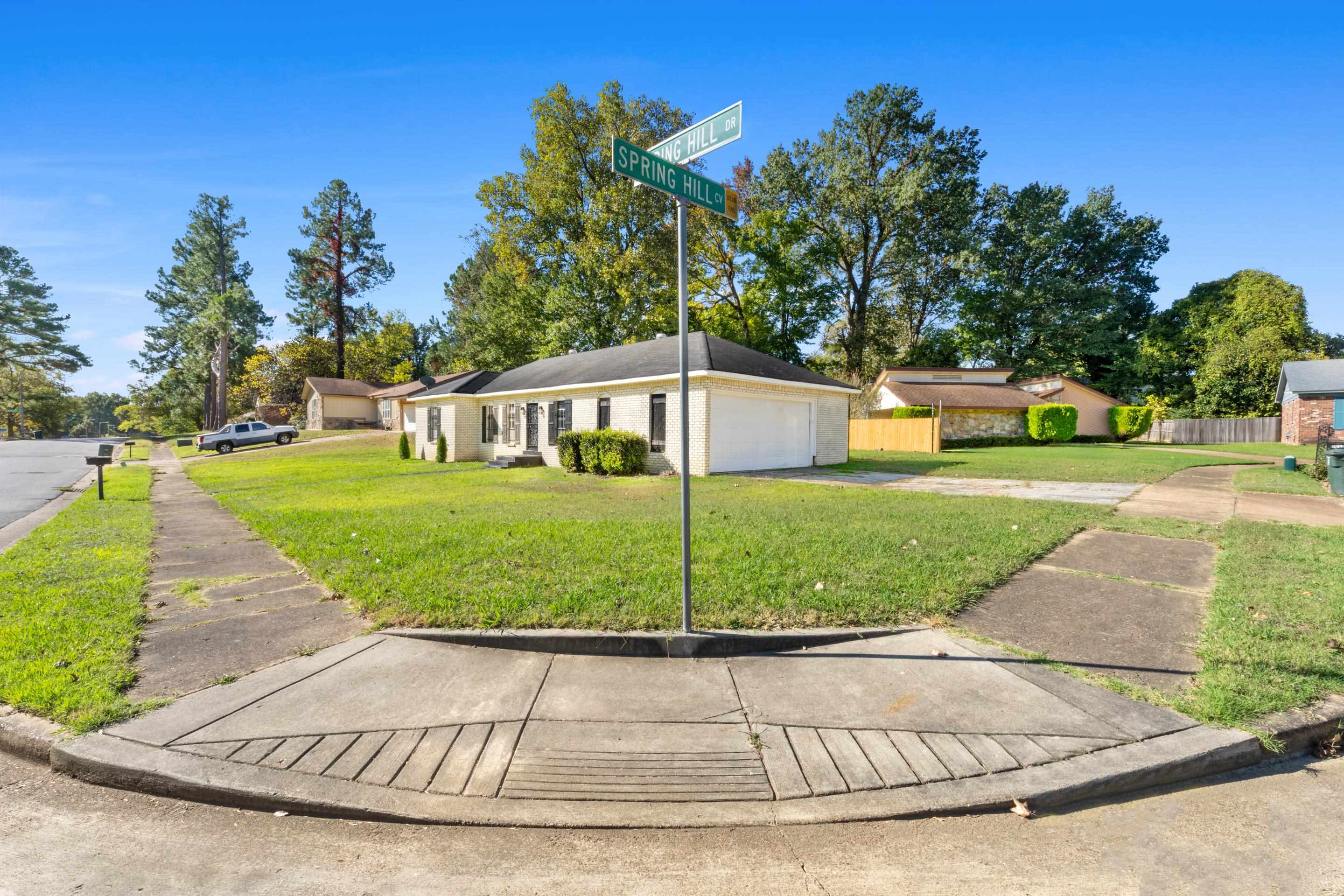 3095 Spring Hill Cove Memphis, TN 38127 - Photo 3 of 29 a view of a house with a yard