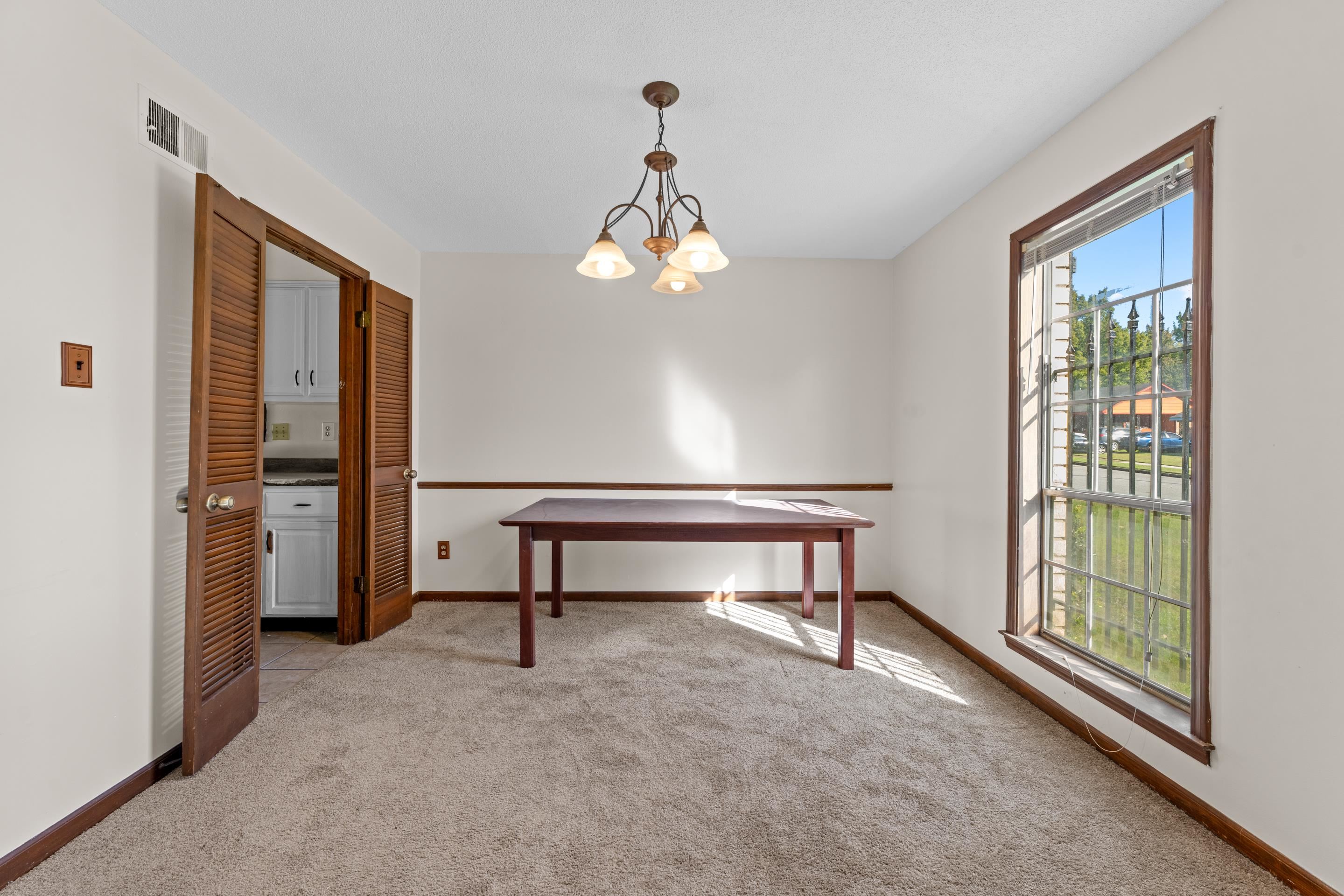 3095 Spring Hill Cove Memphis, TN 38127 - Photo 5 of 29 a bedroom with a bed and a window