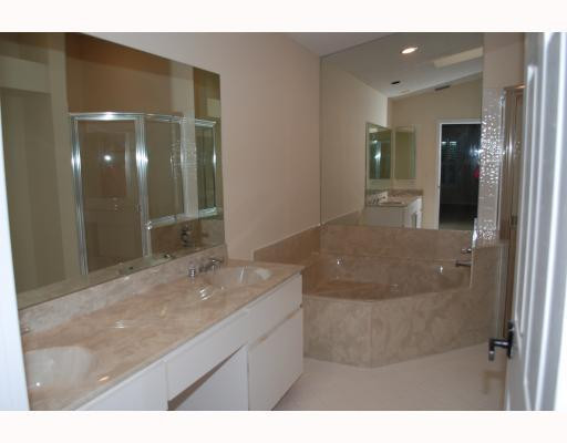 19910 Milan Terrace Boca Raton, FL 33434 - Photo 11 of 14 a bathroom with a sink and a mirror