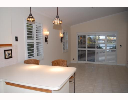 19910 Milan Terrace Boca Raton, FL 33434 - Photo 14 of 14 a bedroom with a bed and a window