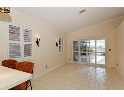 19910 Milan Terrace Boca Raton, FL 33434 - Photo 7 of 14 a view of an empty room with a window