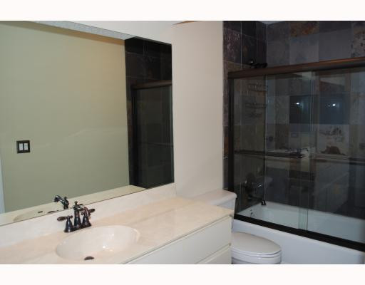 19910 Milan Terrace Boca Raton, FL 33434 - Photo 9 of 14 a bathroom with a sink and a shower