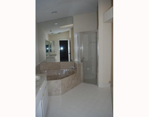 19910 Milan Terrace Boca Raton, FL 33434 - Photo 10 of 14 a bathroom with a sink and a mirror